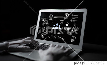 Digital Innovation in Artificial Intelligence with Robotic Hand Interacting with Laptop Displaying Technology Graphics on Black Background Gantry Digital Innovation in Artificial Intelligence with Robotic Hand Interacting with Laptop Displaying Technology Graphics on Black Background Gantry 138824137