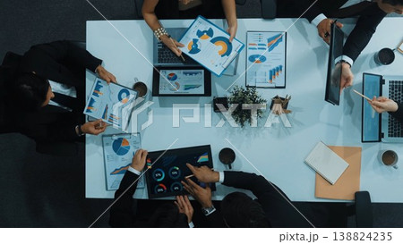 Top view of business people discussing about financial strategy. Directorate. Top view of business people discussing about financial strategy. Directorate. 138824235