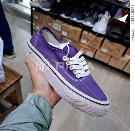 Yogyakarta, Indonesia - March 18th 2026 - Vibrant Casual Purple Sneaker in Shoe Store Energetic Yogyakarta, Indonesia - March 18th 2026 - Vibrant Casual Purple Sneaker in Shoe Store Energetic 138826275