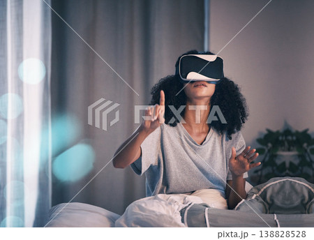 Woman, bed and vr glasses in night, home and online in metaverse, matrix and press with finger for choice. Girl, augmented reality games and vision for 3d user experience, dark bedroom and apartment Woman, bed and vr glasses in night, home and online in metaverse, matrix and press with finger for choice. Girl, augmented reality games and vision for 3d user experience, dark bedroom and apartment 138828528