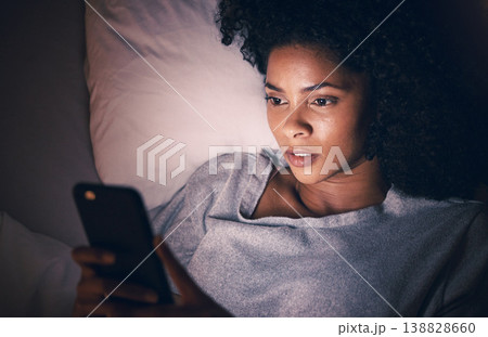 Sad, night and phone with woman in bedroom for social media app, insomnia and networking. Communication, contact and internet with female person in bed at home for mobile, online and technology 138828660