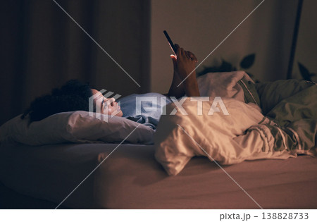 Online, night and phone with woman in bedroom for social media app, insomnia and networking. Communication, contact and internet with female person in bed at home for mobile, search and technology Online, night and phone with woman in bedroom for social media app, insomnia and networking. Communication, contact and internet with female person in bed at home for mobile, search and technology 138828733