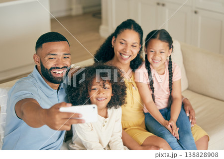 Family, home selfie and children with parents on social media, online memory and bond together on sofa. Happy biracial kids and girl or mother and father in profile picture or photography for holiday 138828908