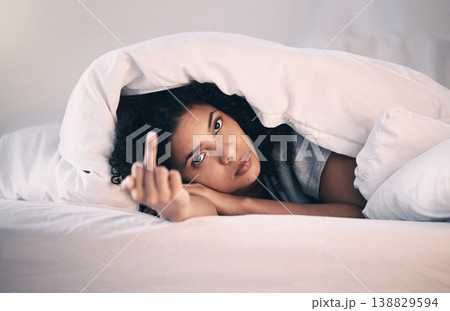 Angry, woman with insomnia and portrait in bed with a middle finger for morning or waking up, sleeping in bedroom or at home. Hand, show a curse sign and frustrated with sleep problem at night Angry, woman with insomnia and portrait in bed with a middle finger for morning or waking up, sleeping in bedroom or at home. Hand, show a curse sign and frustrated with sleep problem at night 138829594
