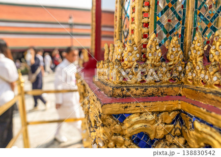 Close views show glass mosaic, gilded trim, and exterior ornament at Wat Phra Kaew. The details highlight temple craft and facade texture. 138830542