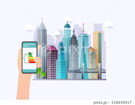 Hand holding phone with energy efficiency rating. Smart home. Flat design style vector illustration concept of smart house technology system with centralized control. City on a background. Hand holding phone with energy efficiency rating. Smart home. Flat design style vector illustration concept of smart house technology system with centralized control. City on a background. 138830917