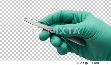 Gloved hand holding a sterile surgical scalpel with a plastic transparent safety shield or blade guard, representing sharps safety and operative precision 138830985