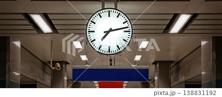 Clock at subway station. Large clock face public transport on a train station platform.  138831192