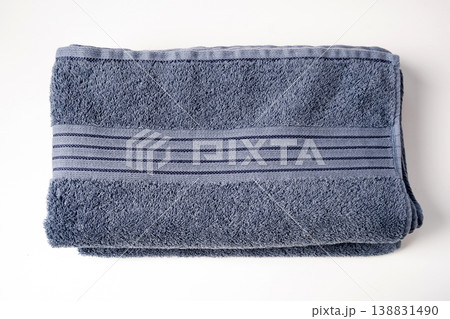 Folded bath towel isolated on white background 138831490