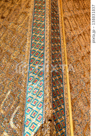 Sunlight catches mirror glass, painted surfaces, and gold edges across the temple exterior. Each close crop emphasizes texture, shine, and depth. Sunlight catches mirror glass, painted surfaces, and gold edges across the temple exterior. Each close crop emphasizes texture, shine, and depth. 138831837