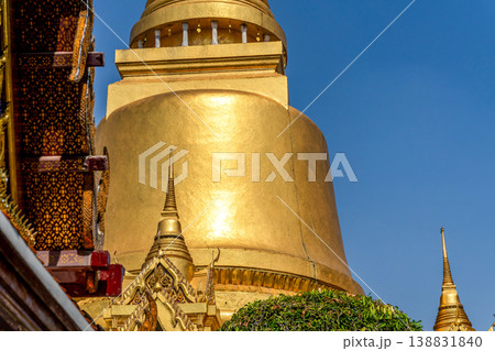 Sunlight catches mirror glass, painted surfaces, and gold edges across the temple exterior. Each close crop emphasizes texture, shine, and depth. Sunlight catches mirror glass, painted surfaces, and gold edges across the temple exterior. Each close crop emphasizes texture, shine, and depth. 138831840