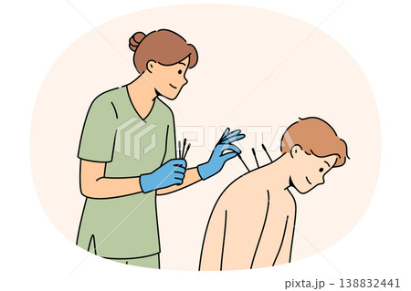 Acupuncture procedure from eastern alternative medicine for man sitting near woman doctor Acupuncture procedure from eastern alternative medicine for man sitting near woman doctor 138832441