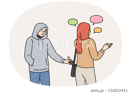 Thief steals wallet from woman bag while she is talking on phone, stealing money from passers-by Thief steals wallet from woman bag while she is talking on phone, stealing money from passers-by 138832451