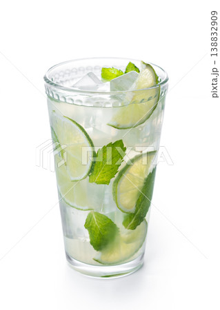 Fresh mojito cocktail with lime mint and ice in glass isolated on white background 138832909