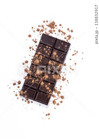 Milk chocolate bar with cocoa powder isolated on white background Milk chocolate bar with cocoa powder isolated on white background 138832917