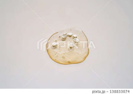 Clear cosmetic gel serum drop with bubbles 138833074