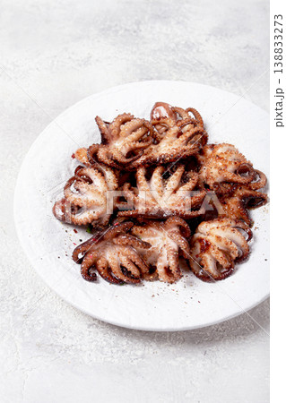 Baby octopus grilled on a white plate, homemade, no people, Baby octopus grilled on a white plate, homemade, no people, 138833273