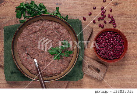 Red bean lobio,a traditional Georgian dish, on a wooden table, homemade, 138833315