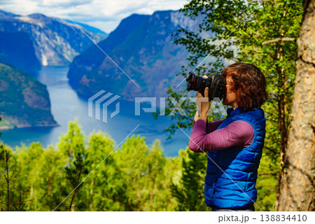 Tourist on nature take travel picture, Norway 138834410