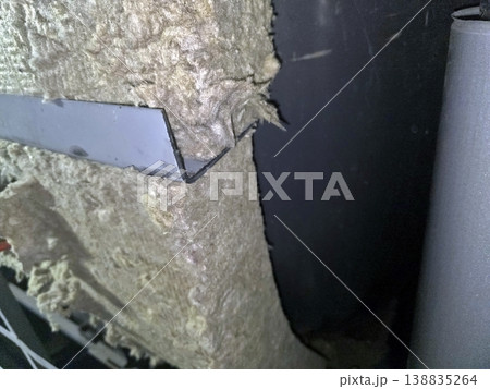 Mineral Wool Insulation Seen in Construction Setting With Metal Framing Detail 138835264