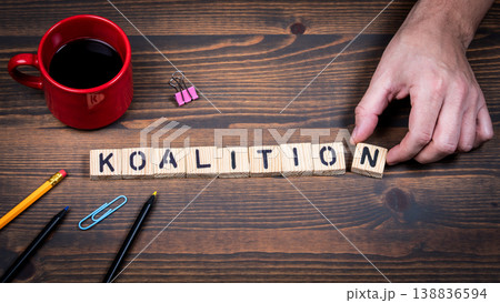 Coalition Concept With German Word Koalition Formed by Wooden Letter Blocks 138836594