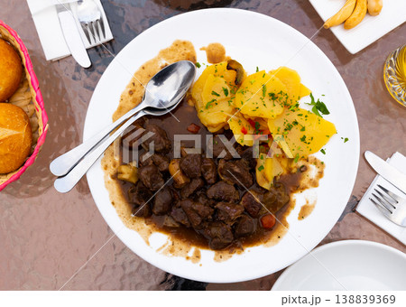 Appetizing stew of port wine with thyme and mushrooms Appetizing stew of port wine with thyme and mushrooms 138839369