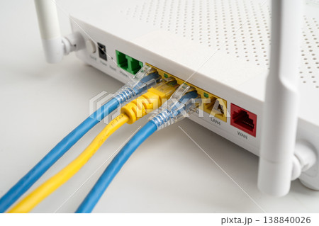 Ethernet cable with wireless router connect to internet service provider internet network. 138840026