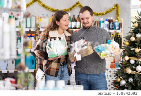 Couple shopping for Christmas presents together at home goods store 138842092