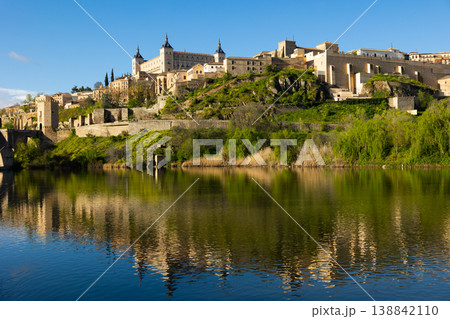 Alcantara bridge and Alcazar fortress, Toledo, Spain Alcantara bridge and Alcazar fortress, Toledo, Spain 138842110
