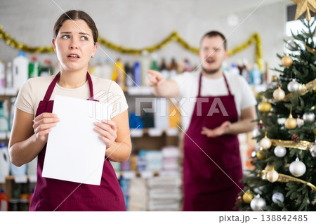 Male manager is unhappy with female salesperson - he yells at her and throws her out of work 138842485