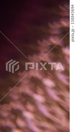 Bokeh crystal reflection. Art glow background. Echo effect light on black texture. Pink purple kaleidoscopic shiny color flare defocused beam. Bokeh crystal reflection. Art glow background. Echo effect light on black texture. Pink purple kaleidoscopic shiny color flare defocused beam. 138843694
