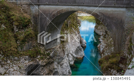 A view towards the Napoleon Bridge over the Soca river in Slovenia A view towards the Napoleon Bridge over the Soca river in Slovenia 138845491