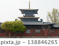 Traditional Pagoda Temple With Tiled Roof, Wooden Facade and Trees in Courtyard 138846265