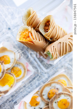 Stack of pancake roll filled with assorted filling. Stack of pancake roll filled with assorted filling. 138847501