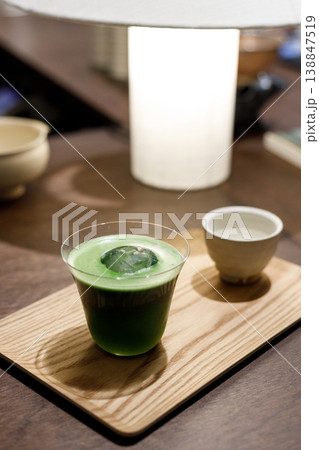 Cup of fresh matcha tea, green tea on wooden table. Selective focus. 138847519