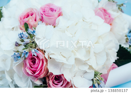 bouquet flowers background white hydrangea flowers and pink roses. bouquet flowers background white hydrangea flowers and pink roses. 138850137