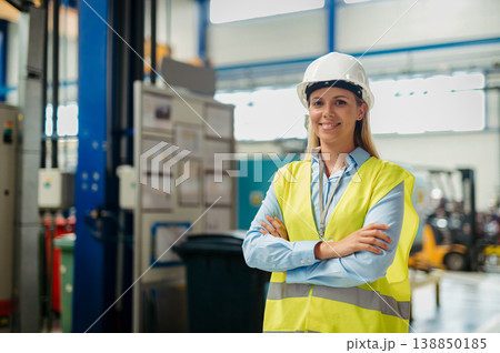 Female engineer or technician working in modern factory. Female engineer or technician working in modern factory. 138850185