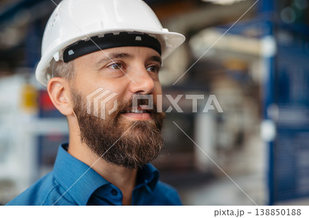 A portrait of project manager or engineer a factory, working. A portrait of project manager or engineer a factory, working. 138850188