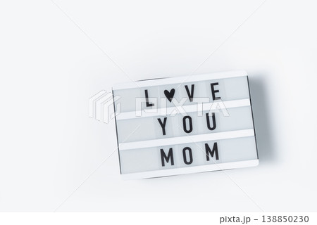 Mothers day, Lightbox with quote Text LOVE YOU MOM Greeting card. Mothers day, Lightbox with quote Text LOVE YOU MOM Greeting card. 138850230