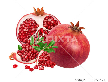 Pomegranate with half isolated on white background with full depth of field. Pomegranate with half isolated on white background with full depth of field. 138854574