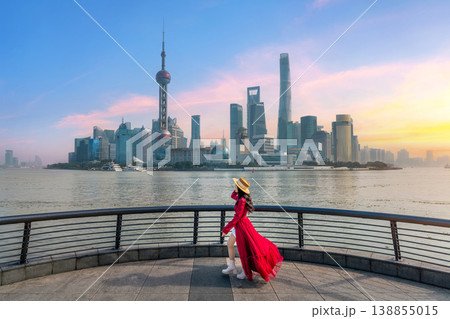 Tourists sightseeing on The Bund and Lujiazui of Shanghai, China. 138855015