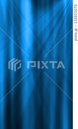 Soft blue light rays streaming through darkness, forming a smooth atmospheric abstract background with motion and depth 138855078