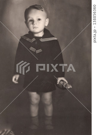 Vintage toddler boy in sailor suit studio portrait sepia Vintage toddler boy in sailor suit studio portrait sepia 138856360