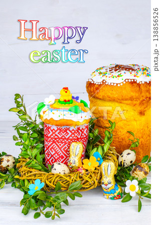 Easter cake and painted eggs, white flowers, festive composition in rustic style,ukrainian orthodox tradition, vintage wooden background, selective focus 138856526