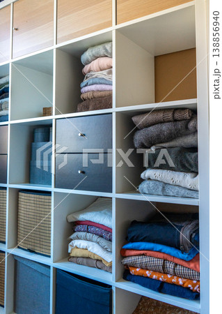 Spring cleaning wardrobe organization with eco-friendly decluttering. Spring cleaning wardrobe organization with eco-friendly decluttering. 138856940