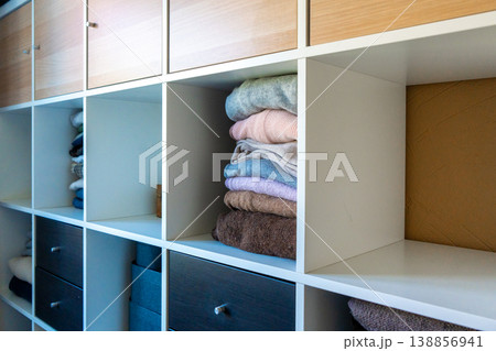 Spring cleaning wardrobe organization with eco-friendly decluttering. Spring cleaning wardrobe organization with eco-friendly decluttering. 138856941