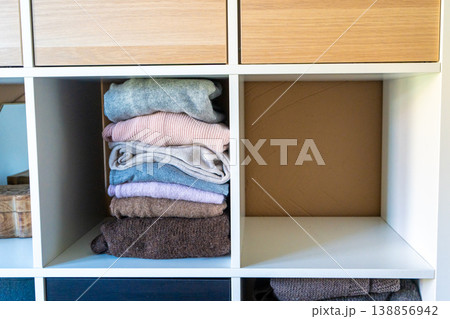 Spring cleaning wardrobe organization with eco-friendly decluttering. Spring cleaning wardrobe organization with eco-friendly decluttering. 138856942