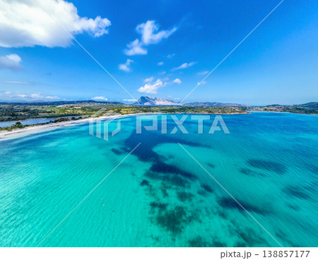 Drone view of Cala Brandinchi under a blue sky 138857177
