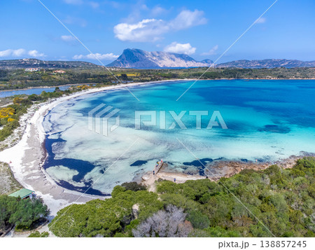 Aerial view of Cala Brandinchi shoreline on a sunny day 138857245