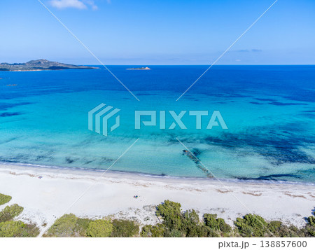 Aerial view of white sand and turquoise water in Lu Impostu beach Aerial view of white sand and turquoise water in Lu Impostu beach 138857600